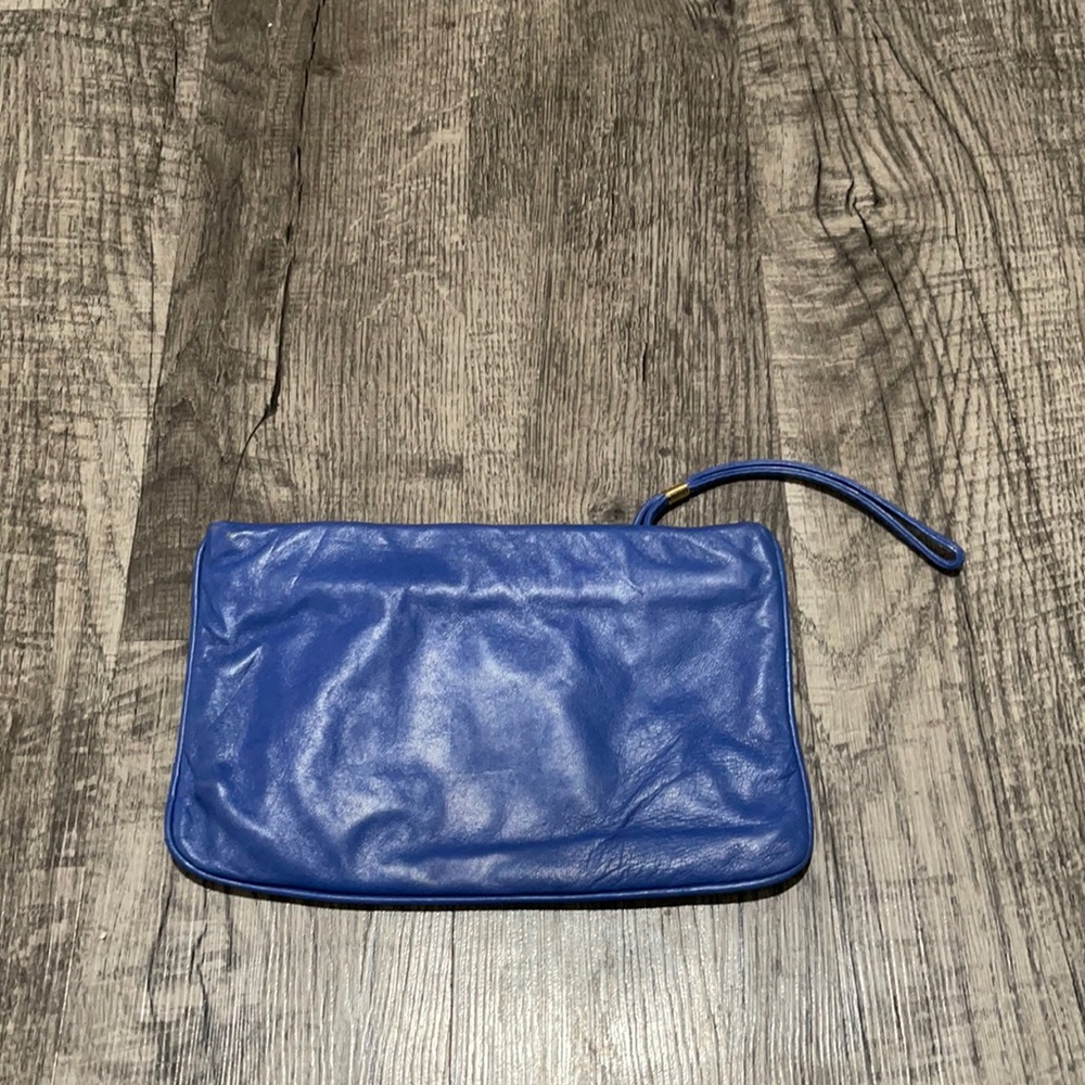 Blue leather clutch